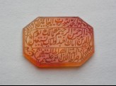 Octagonal bezel amulet with nasta’liq inscription and floral decoration