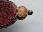 Heart-shaped bezel amulet from a bracelet, with naskhi inscription (LI1008.5)