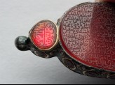 Heart-shaped bezel amulet from a bracelet, with naskhi inscription (LI1008.7)