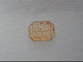Octagonal bezel amulet with thuluth inscription and linear decoration