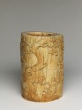 Ivory brush pot with plum blossoms and a poem