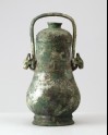 Ritual wine vessel, or you, with taotie pattern and handles in the form of animal heads (LI1301.10)
