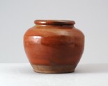 Black ware jar with russet iron glaze