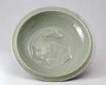 Greenware dish with three carp and lotus petals