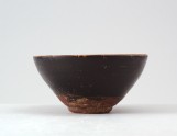 Black ware tea bowl with plum blossom decoration