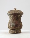 Ritual wine vessel, or zhi, with taotie mask pattern