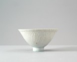 White ware bowl with three boys among foliage