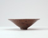 Ding type black ware bowl with russet iron glazes