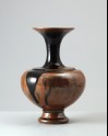 Black ware vase with streak decoration