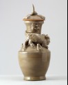 Greenware funerary vase with tiger, a puppy, and bird