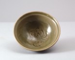 Greenware bowl with flowers and waves
