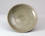 Greenware dish with floral decoration