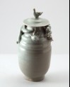 Greenware funerary jar with dragon and a bird