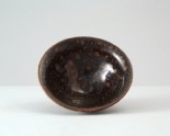 Black ware bowl with russet iron spots