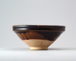 Black ware bowl with russet iron splashes