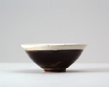 Black ware bowl with white rim