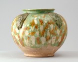 Jar with appliqué arabesque decoration under a three colour glaze