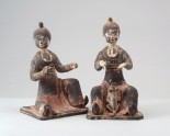 Figure of a seated female attendant