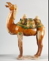Figure of a camel with saddle in the form of an animal mask