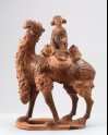 Figure of a camel carrying a young girl (LI1301.422)