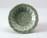 Greenware dish with floral decoration