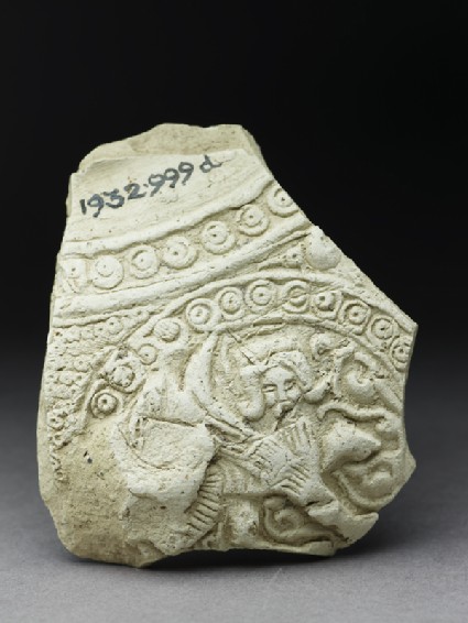 Fragment of a jug with human figure in a roundelfront