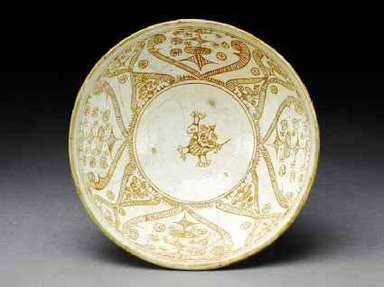 Bowl with stylized bird, scroll decoration, and leavestop