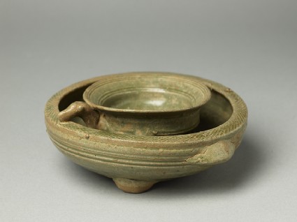 Greenware tripod vessel with inner bowloblique