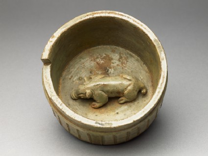 Greenware burial figure of pig in a penoblique