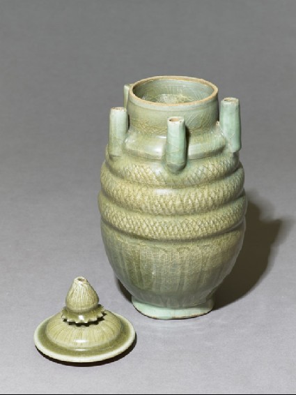 Greenware vase with five spouts and lidoblique, open