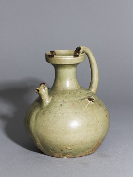 Greenware ewer with chicken head spoutoblique