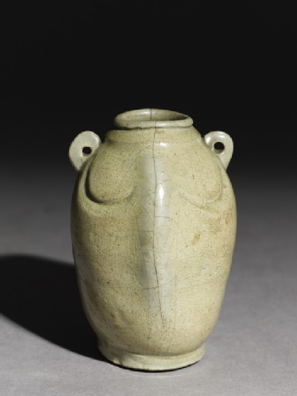 Greenware jar in the form of a double fishoblique