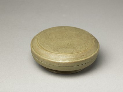 Greenware circular box and lid with floral decorationoblique