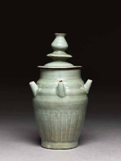 Greenware funerary jar with five spoutsside