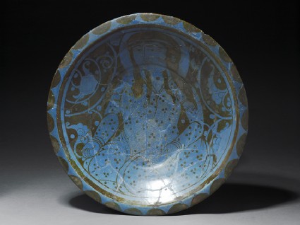 Dish with seated figuretop