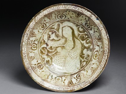 Dish with seated female figure against a foliate backgroundtop