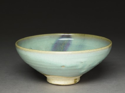 Bowl with purple splashoblique