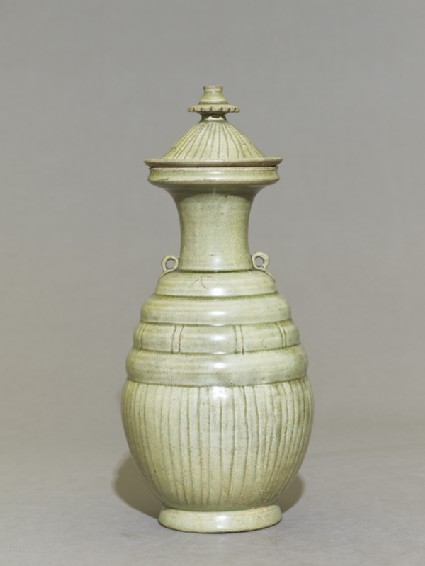 Greenware burial-pot with incised linesside