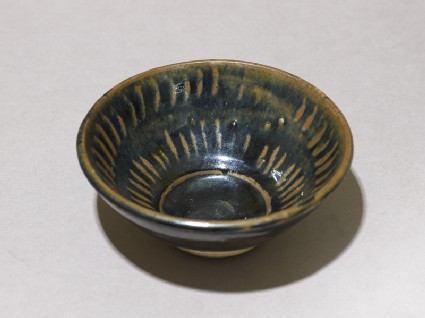 Black ware bowl with stripesoblique