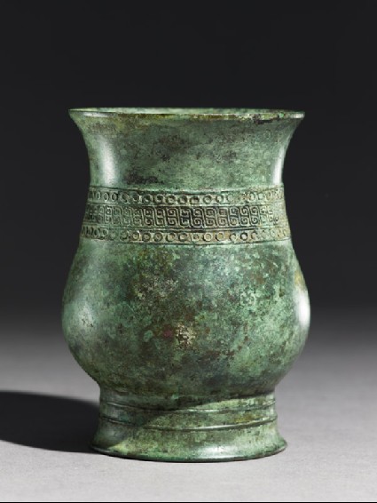 Ritual wine vessel, or zhi, with circles and S-shapesside