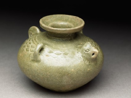 Greenware hu with chicken head and tailoblique