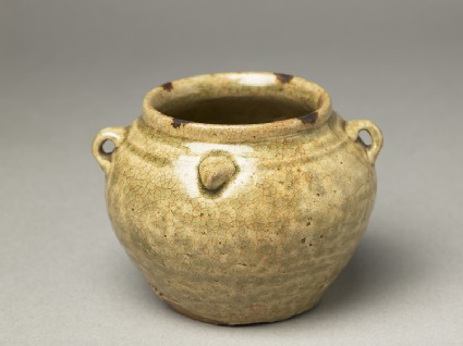 Greenware jar with chicken head and tailoblique