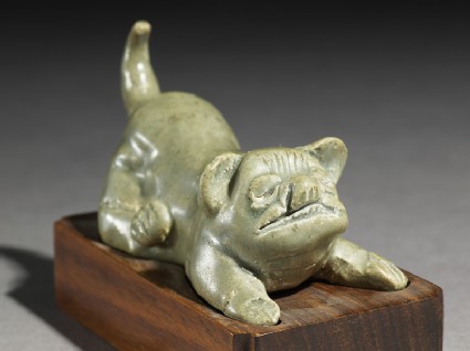 Greenware burial figure of a dogoblique