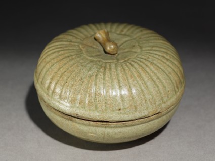 Greenware circular box and lid with lotus coveroblique