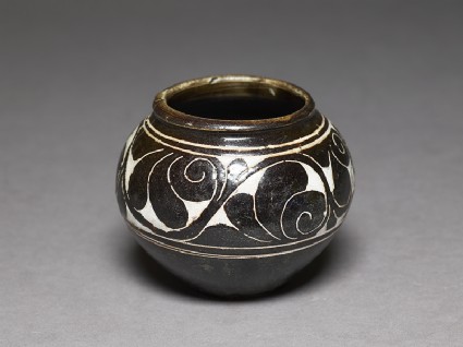 Cizhou type bowl with lotus scroll decorationoblique