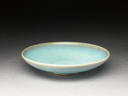 Shallow dish with blue glazeoblique