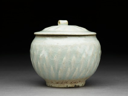 White ware jar with lotus leaf decorationside