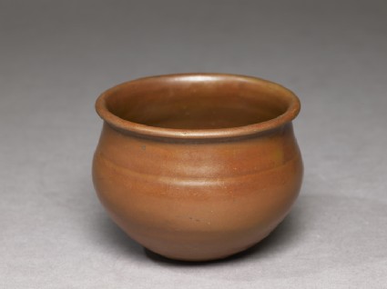 Ding type jar with russet iron glazeoblique