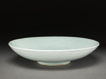 White ware dish with floral decorationoblique