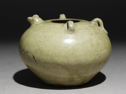 Greenware jar with chicken head and tailoblique